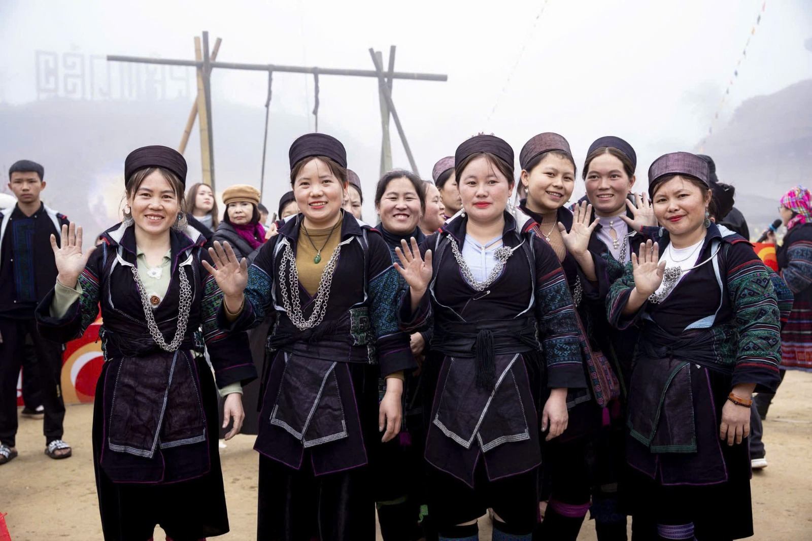 A group of local women wearing embroidered traditional dress